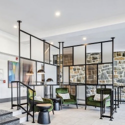 Architectural glass and metal wall partition