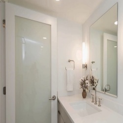 Bathroom hinged door with frosted glass panel