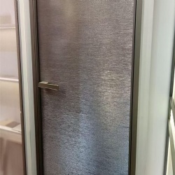 Aluminum swinging door with laminated glass panel